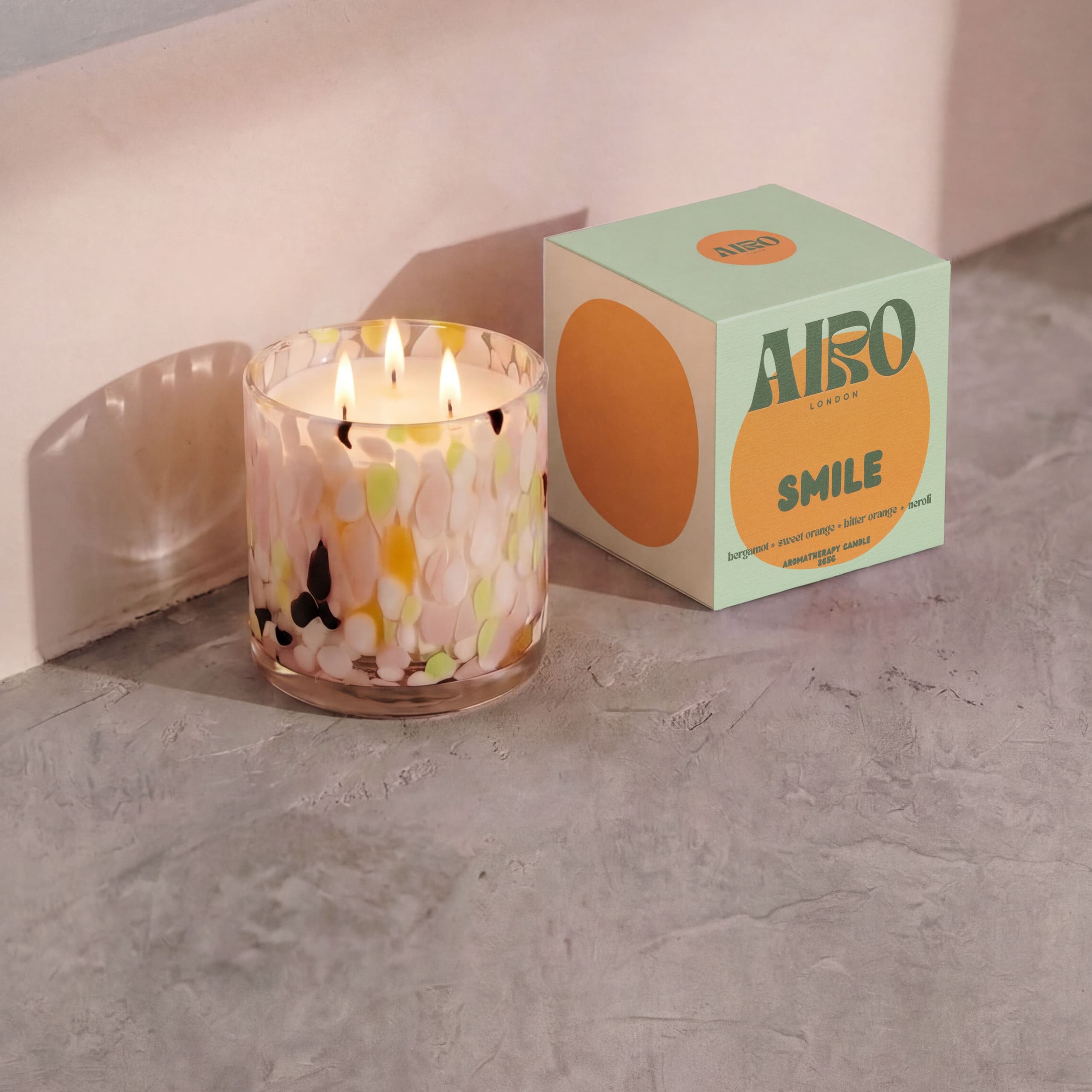 The Happiness Candle in a naturally lit setting